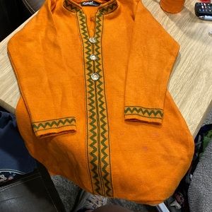 Oswal Soft and Hot orange sweater. Size 22. Has a couple stains